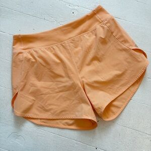 Athleta Girl Run The World 3" Shorts Orange Size L/12 EUC